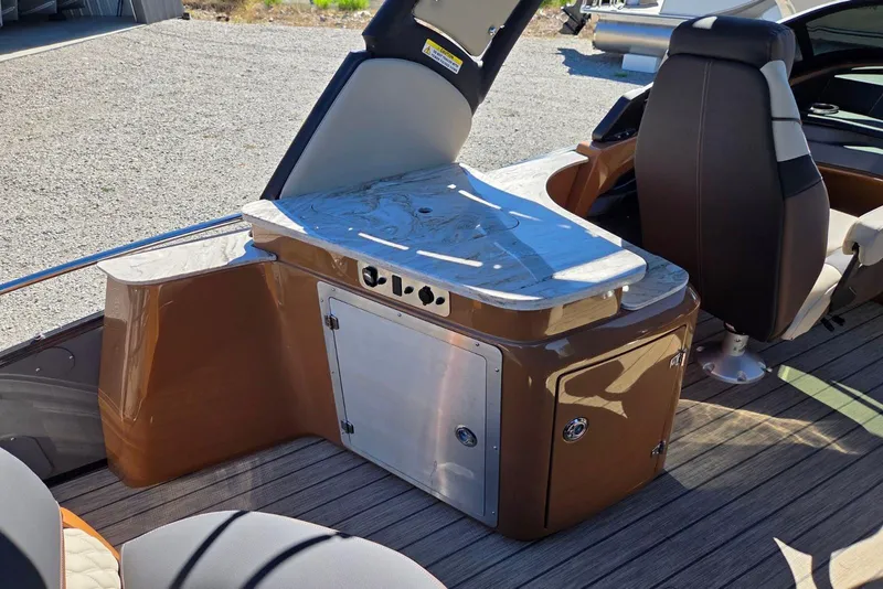 Slide: The Image of 2026 Avalon Platinum Catalina 2785 Elite interior with sleek seating and modern design. - 12