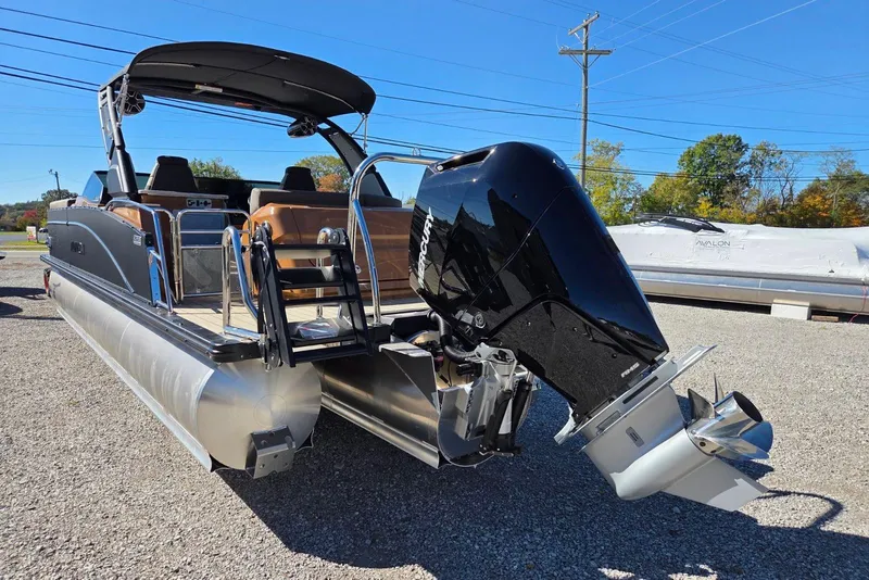 Slide: The Image of 2026 Avalon Platinum Catalina 2785 Elite Windshield pontoon boat with powerful outboard motor. - 6