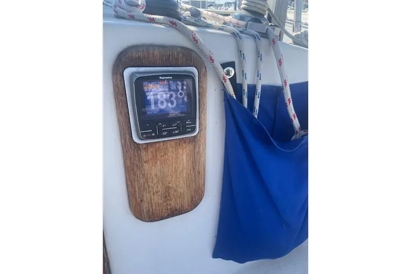 Slide: The Image of Cockpit of 1978 Hinterhoeller Niagara 35 Classic with navigation display and rope storage. - 15