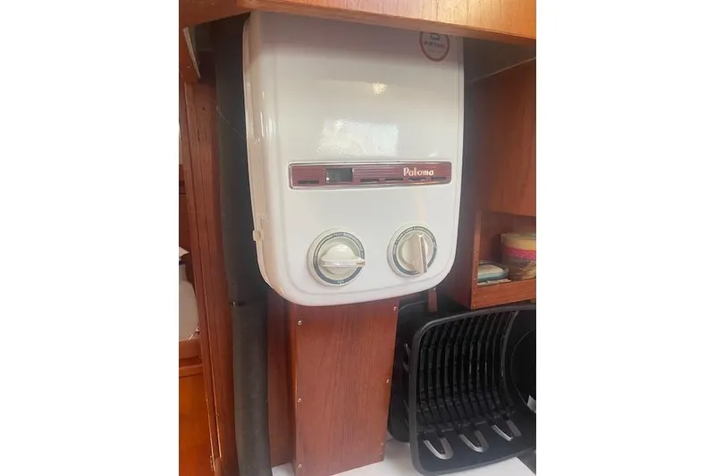 Slide: The Image of 1978 Hinterhoeller Niagara 35 Classic interior with Paloma water heater. - 35