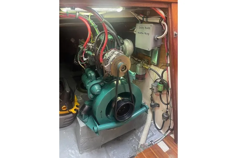 Slide: The Image of Engine compartment of 1978 Hinterhoeller Niagara 35 Classic sailboat, showcasing mechanical components. - 42