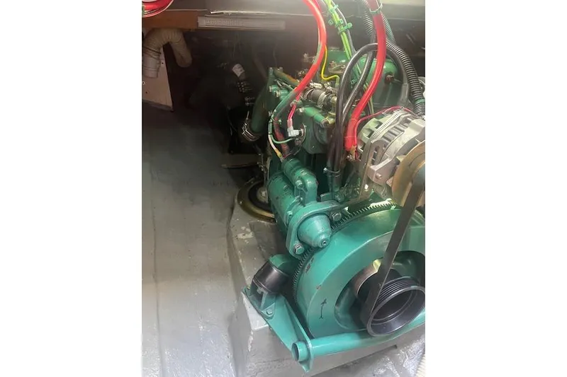 Slide: The Image of Engine compartment of a 1978 Hinterhoeller Niagara 35 Classic sailboat, showcasing mechanical components. - 43