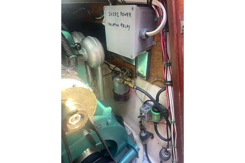 Slide: The Image of Engine compartment of 1978 Hinterhoeller Niagara 35 Classic with shore power isolation relay. - 48