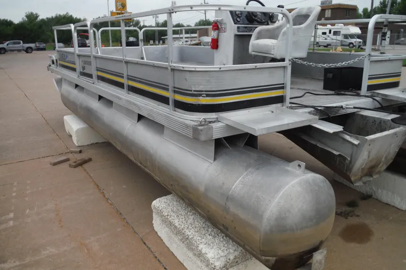 Slide: The Image of 1989 Sea Nymph SS200 SUNCRUISER pontoon boat on concrete blocks in a parking lot. - 11