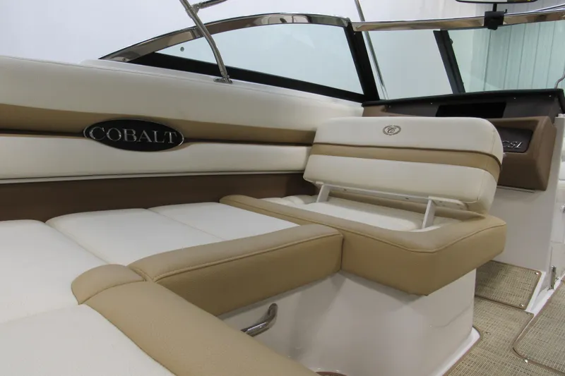Slide: The Image of 2017 Cobalt CS1 boat interior with beige and white seating, showcasing luxury design. - 5