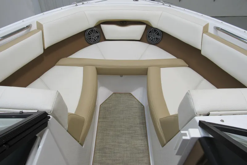 Slide: The Image of Interior of 2017 Cobalt CS1 boat with beige and white seating. - 8