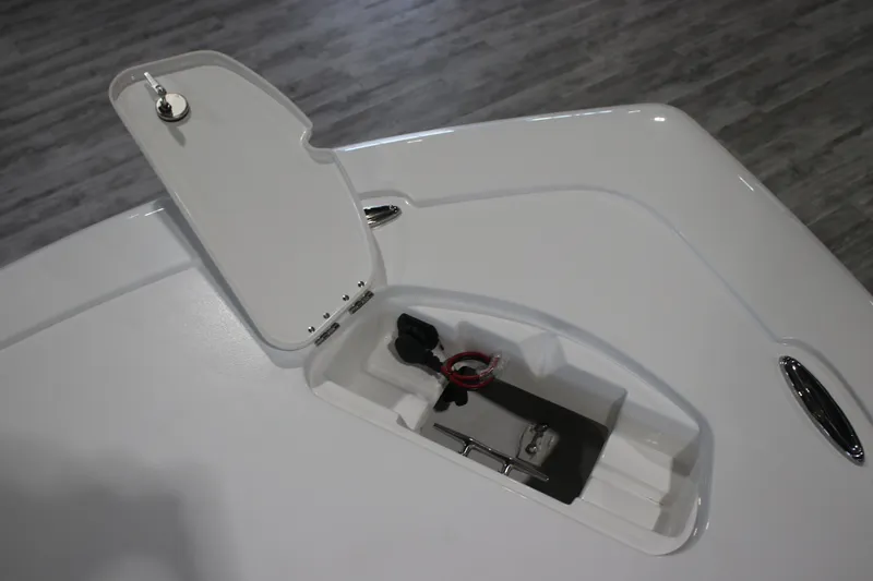 Slide: The Image of 2026 Tidewater 2300 Carolina Bay boat storage compartment with open hatch. - 10