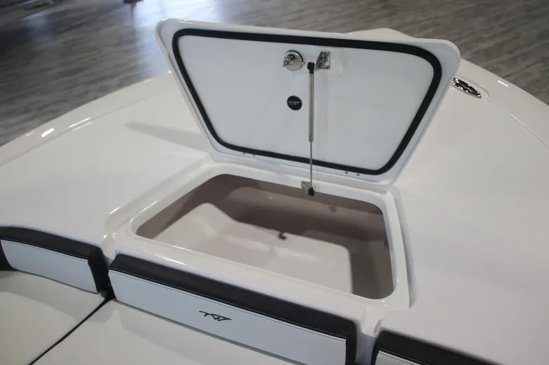 Slide: The Image of Open storage compartment on 2026 Tidewater 2300 Carolina Bay boat. - 11