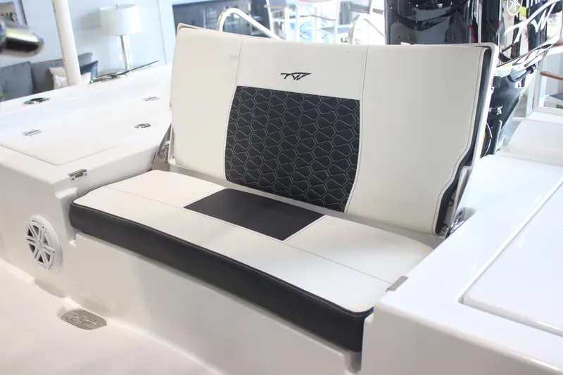 Slide: The Image of 2026 Tidewater 2300 Carolina Bay boat seat with stylish black and white upholstery. - 18