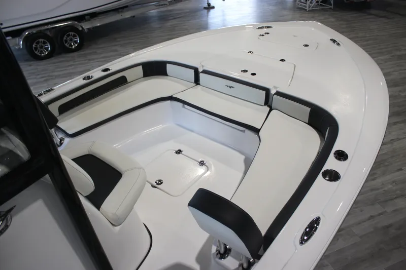 Slide: The Image of 2026 Tidewater 2300 Carolina Bay boat interior with sleek seating and modern design. - 7