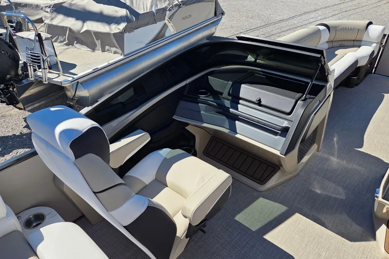 Slide: The Image of 2026 Avalon 2785 Excalibur LTD Windshield Quad Lounger interior with luxurious seating. - 13
