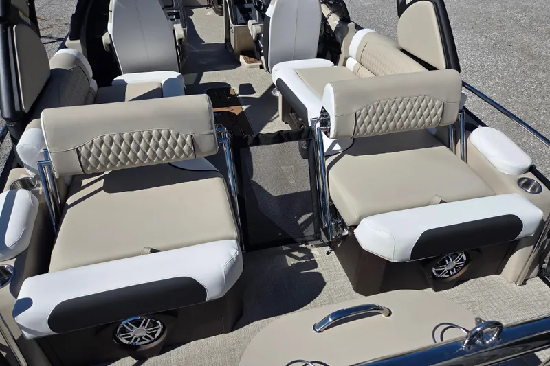 Slide: The Image of Luxurious seating on 2026 Avalon 2785 Excalibur LTD Windshield Quad Lounger boat. - 17