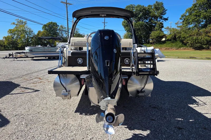 Slide: The Image of 2026 Avalon 2785 Excalibur LTD pontoon boat with quad lounger and windshield, rear view. - 6