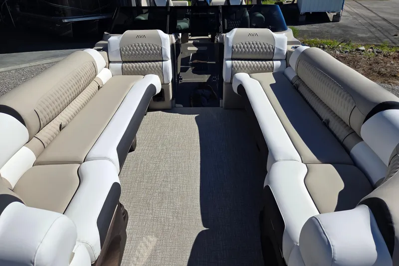 Slide: The Image of Luxurious seating on 2026 Avalon 2785 Excalibur LTD Windshield Quad Lounger boat. - 9
