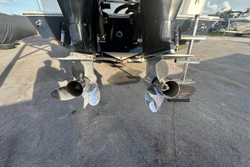 Slide: The Image of 2001 Contender 35 Side Console boat interior with spacious deck and seating area. - 12