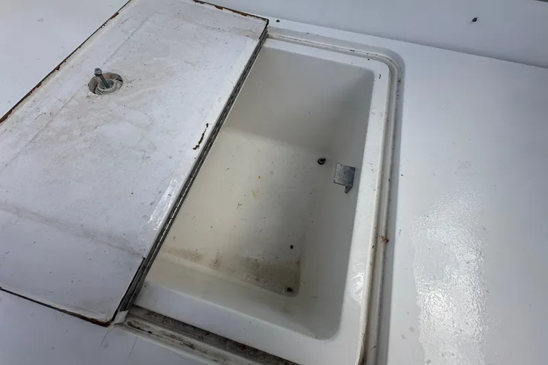 Slide: The Image of 2001 Contender 35 Side Console helm with navigation screens and controls. - 22