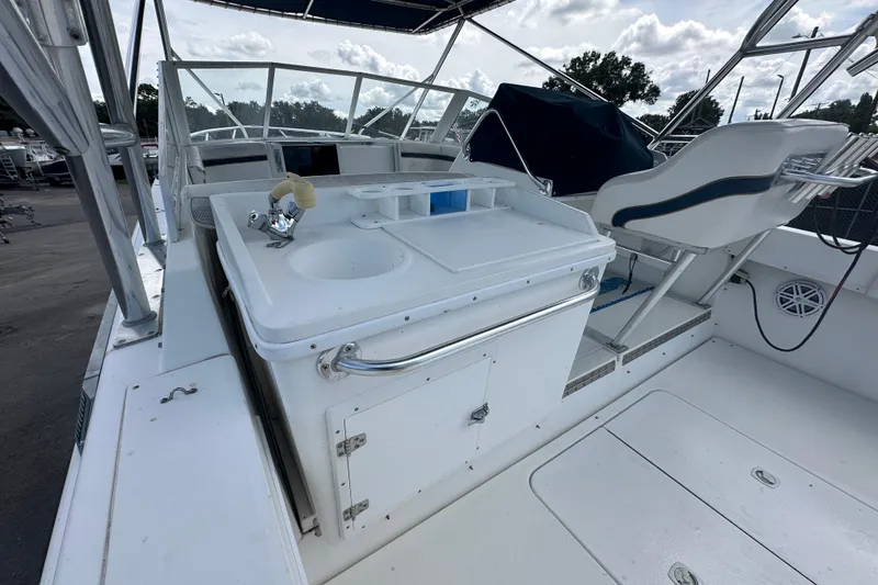 Slide: The Image of Tachometer of 2001 Contender 35 Side Console showing RPM and voltage readings. - 27