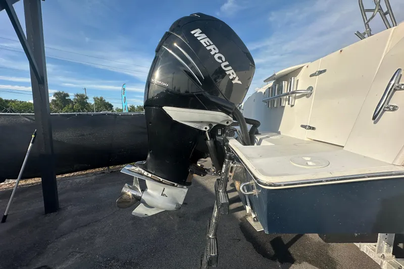 Slide: The Image of 2001 Contender 35 Side Console with twin 350 engines at a boat sale event. - 3