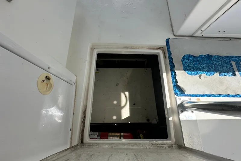 Slide: The Image of Control panel of a 2001 Contender 35 Side Console boat with navigation screens. - 31