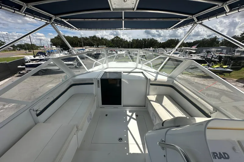 Slide: The Image of 2001 Contender 35 Side Console boat interior with storage compartment. - 39
