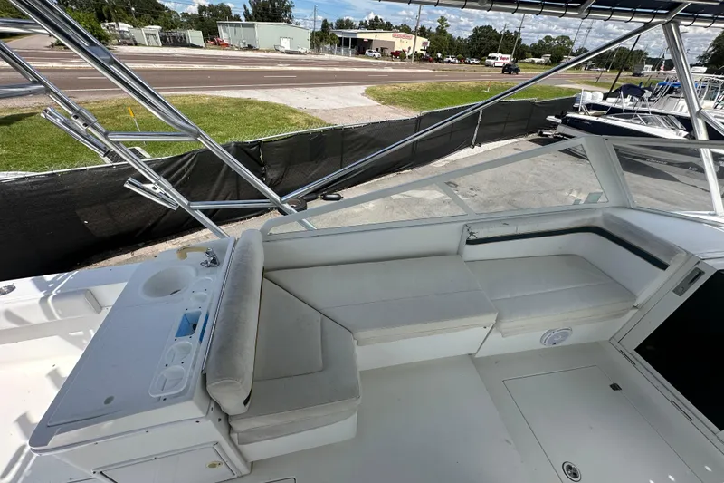 Slide: The Image of 2001 Contender 35 Side Console interior storage compartment with white and blue trim. - 41