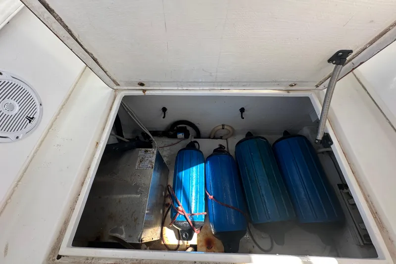Slide: The Image of Anchor storage compartment on a 2001 Contender 35 Side Console boat. - 50