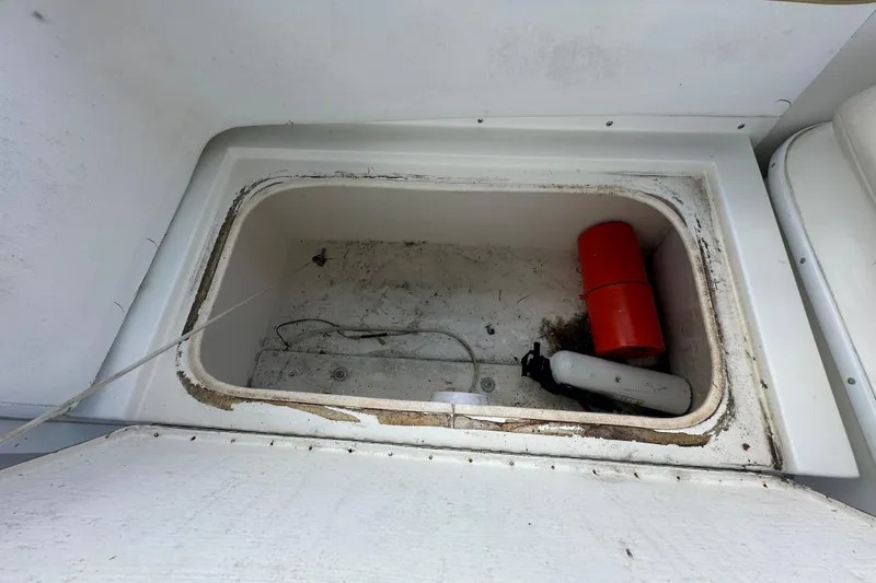 Slide: The Image of Aging microwave in 2001 Contender 35 Side Console boat interior. - 55