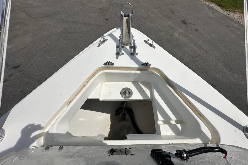 Slide: The Image of 2001 Contender 35 Side Console boat bathroom with sink and toilet. - 81