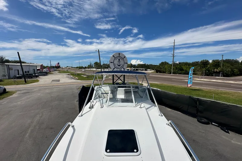 Slide: The Image of Wooden steps inside a 2001 Contender 35 Side Console boat. - 82