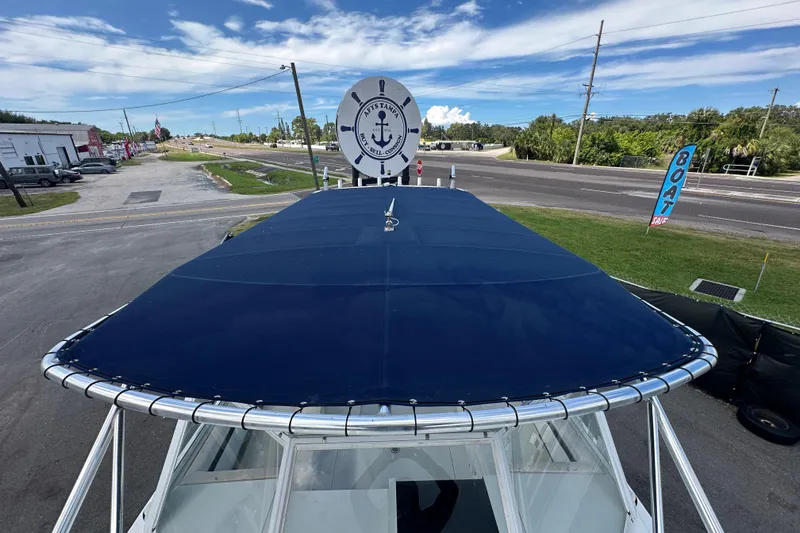 Slide: The Image of 2001 Contender 35 Side Console boat interior with seating, for sale display. - 85