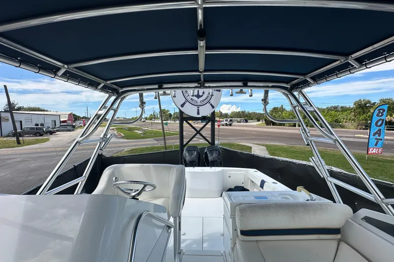 Slide: The Image of 2001 Contender 35 Side Console boat interior with spacious deck and seating. - 91