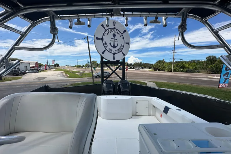 Slide: The Image of Open storage compartment on 2001 Contender 35 Side Console boat. - 95