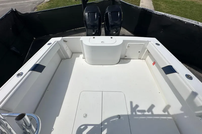 Slide: The Image of Open compartment on 2001 Contender 35 Side Console boat showing internal components. - 98