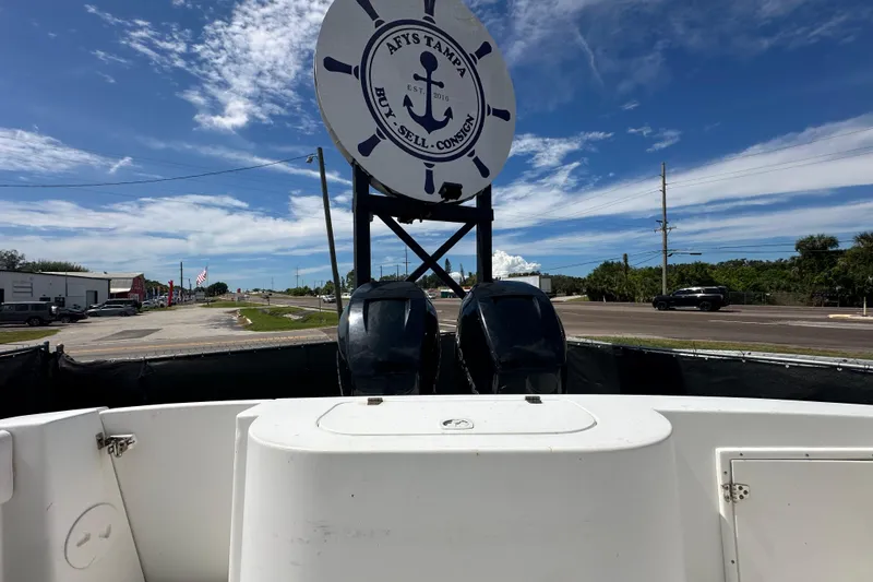 Slide: The Image of Triple axle trailer with alloy wheels for 2001 Contender 35 Side Console boat. - 99