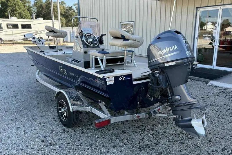 Slide: The Image of 2021 G3 Bay 17 boat with Yamaha outboard motor on trailer. - 11