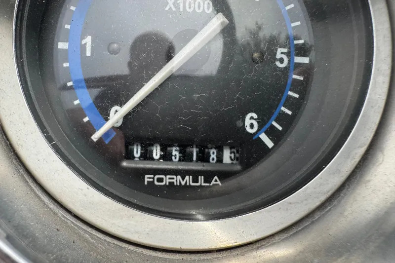 Slide: The Image of Close-up of a 2007 Formula 240 Bowrider tachometer showing 518.5 hours. - 18