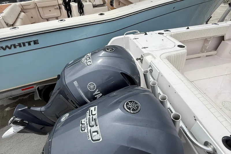 Slide: The Image of 2001 Grady-White Marlin 300 boat with dual Yamaha outboard engines. - 25