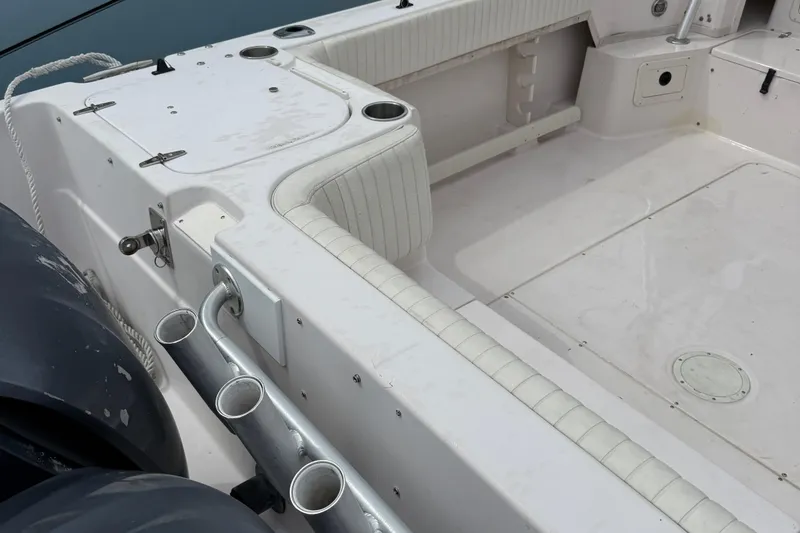 Slide: The Image of 2001 Grady-White Marlin 300 boat interior with rod holders and seating. - 27