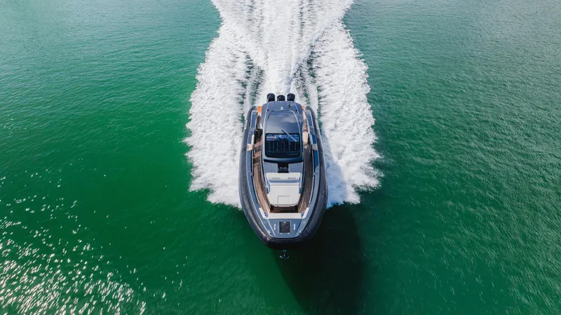 Slide: The Image of 2023 Pirelli Tecnorib 50 cruising on open water, aerial view. - 28