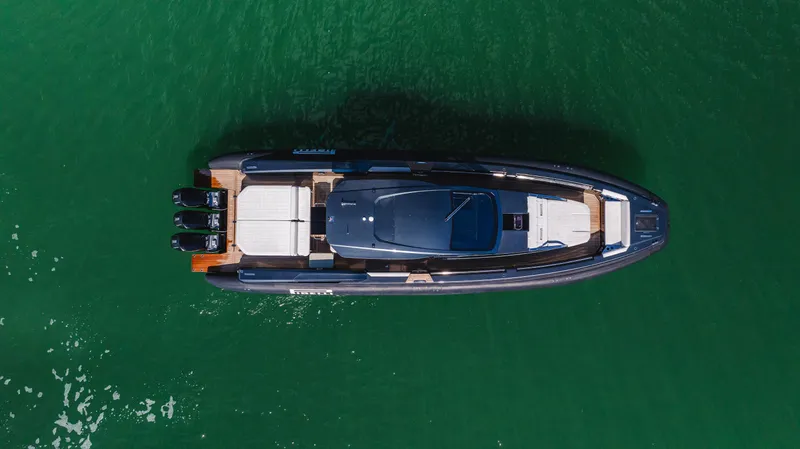 Slide: The Image of Aerial view of 2023 Pirelli Tecnorib 50 boat on green water. - 41