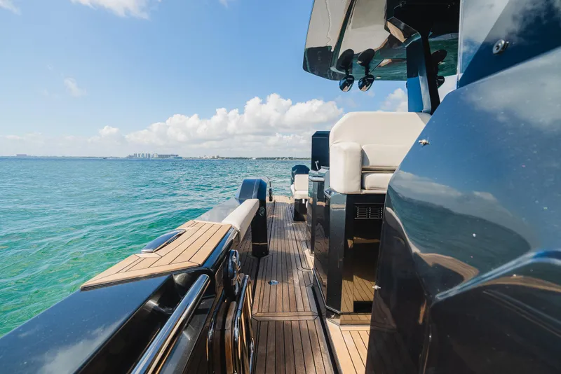 Slide: The Image of 2023 Pirelli Tecnorib 50 yacht on open water, showcasing sleek design and luxury features. - 42