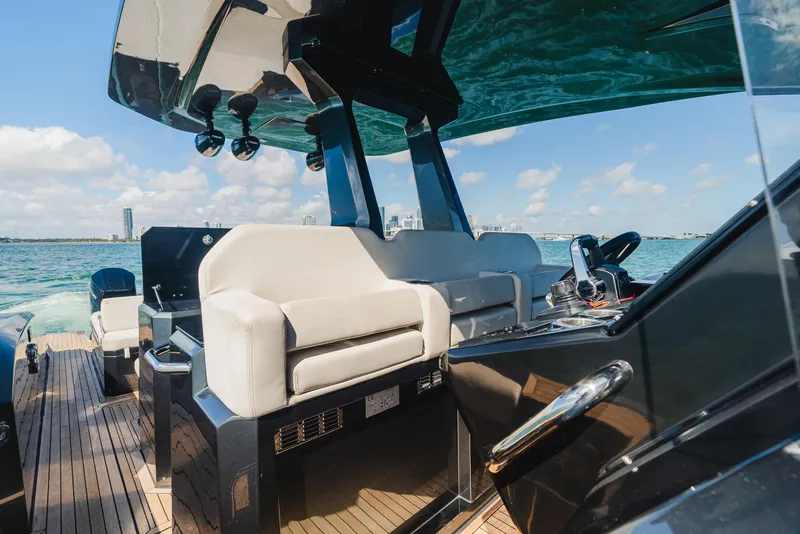 Slide: The Image of 2023 Pirelli Tecnorib 50 luxury yacht interior with modern seating and sleek design. - 44