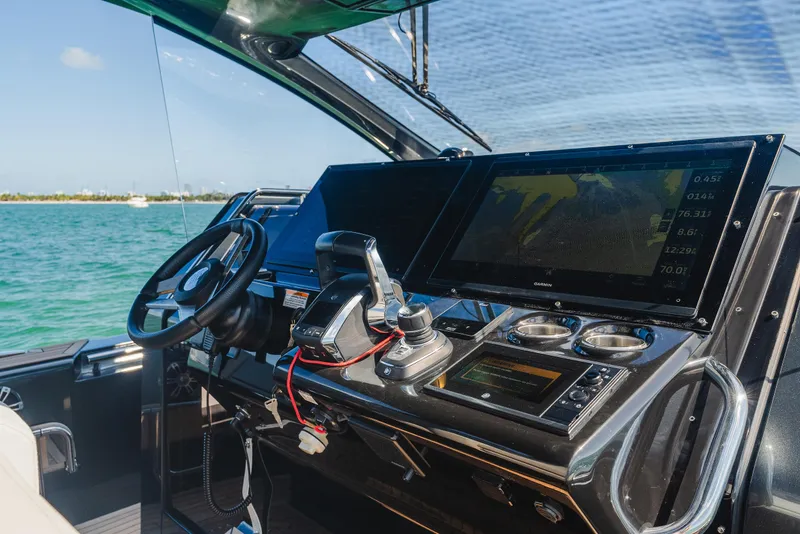 Slide: The Image of Cockpit of 2023 Pirelli Tecnorib 50 boat with modern navigation equipment. - 45