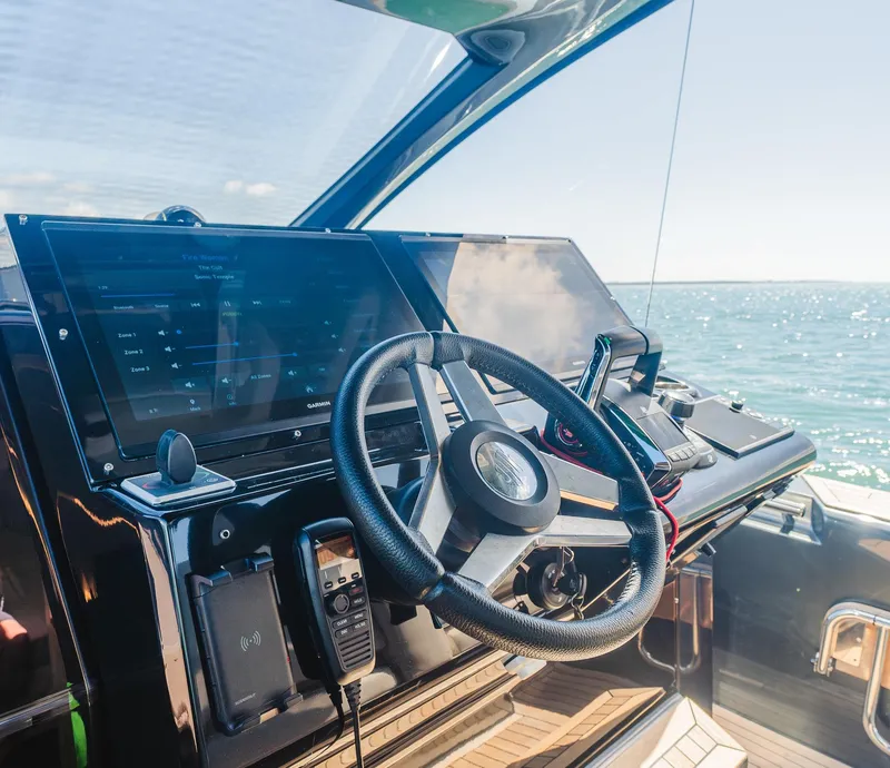 Slide: The Image of Cockpit of 2023 Pirelli Tecnorib 50 boat with modern navigation equipment. - 46