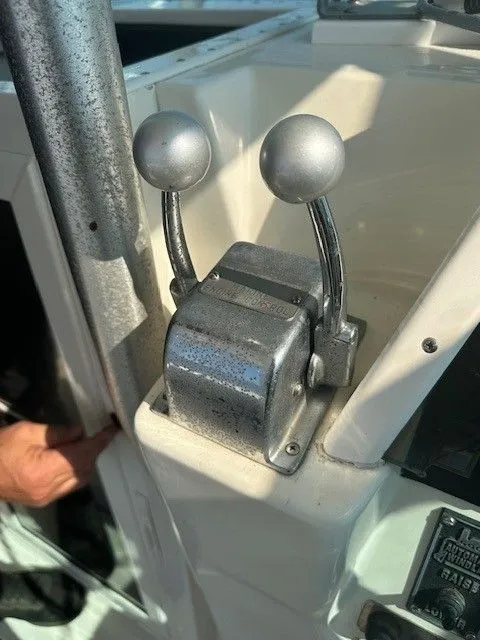 Slide: The Image of Dual throttle controls on a 1987 Shamrock 31 GS boat. - 10