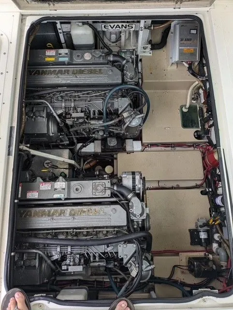 Slide: The Image of Engine compartment of a 1987 Shamrock 31 GS with dual Yanmar diesel engines. - 2