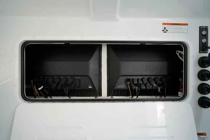 Slide: The Image of Electrical panel with Garmin systems on 2026 Invincible 40 Catamaran. - 38