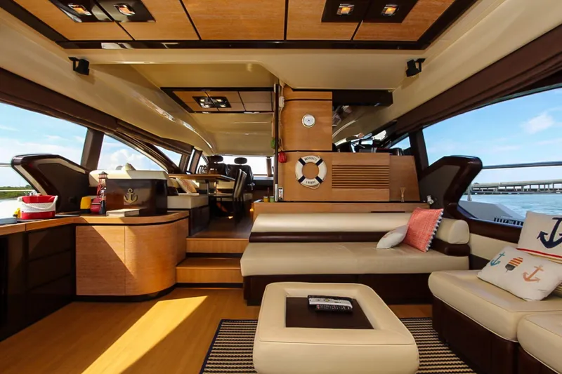 Slide: The Image of Luxurious interior of 2011 Azimut 70 yacht with modern furnishings and panoramic windows. - 11