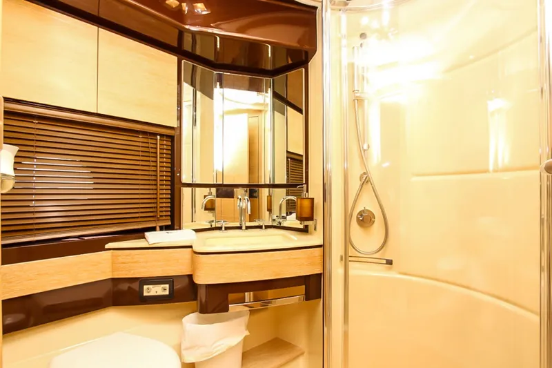 Slide: The Image of Luxurious bathroom interior of 2011 Azimut 70 yacht with modern fixtures and shower. - 34