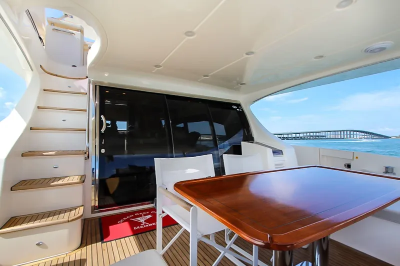 Slide: The Image of Luxurious 2011 Azimut 70 yacht interior with dining area and ocean view. - 37